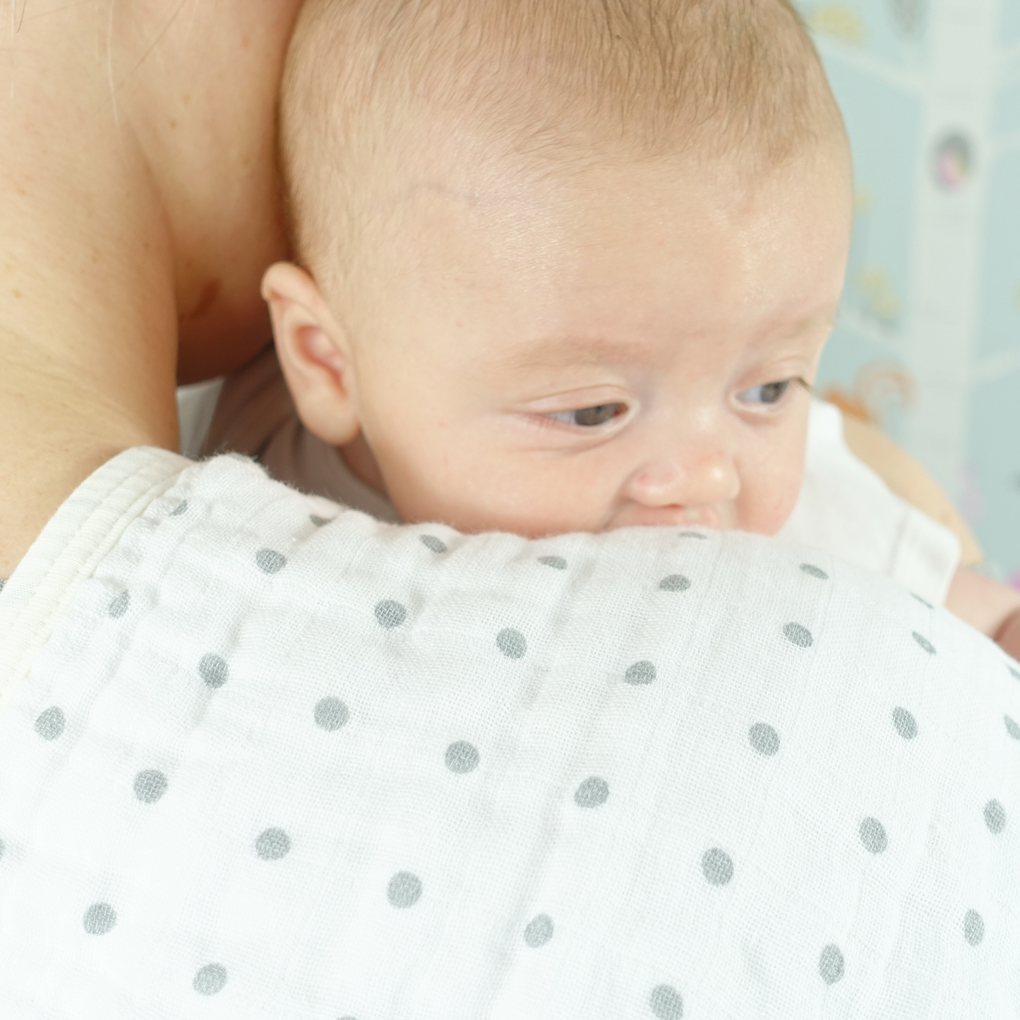 Burp cloth on shoulder with baby Lifestyle