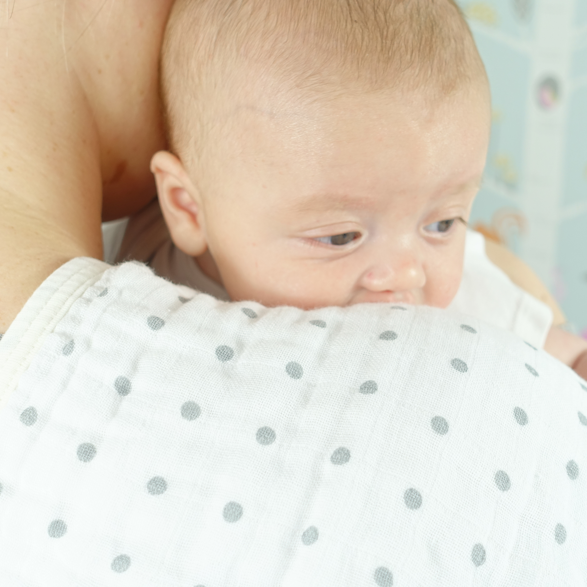 Burp cloth on shoulder with baby Lifestyle