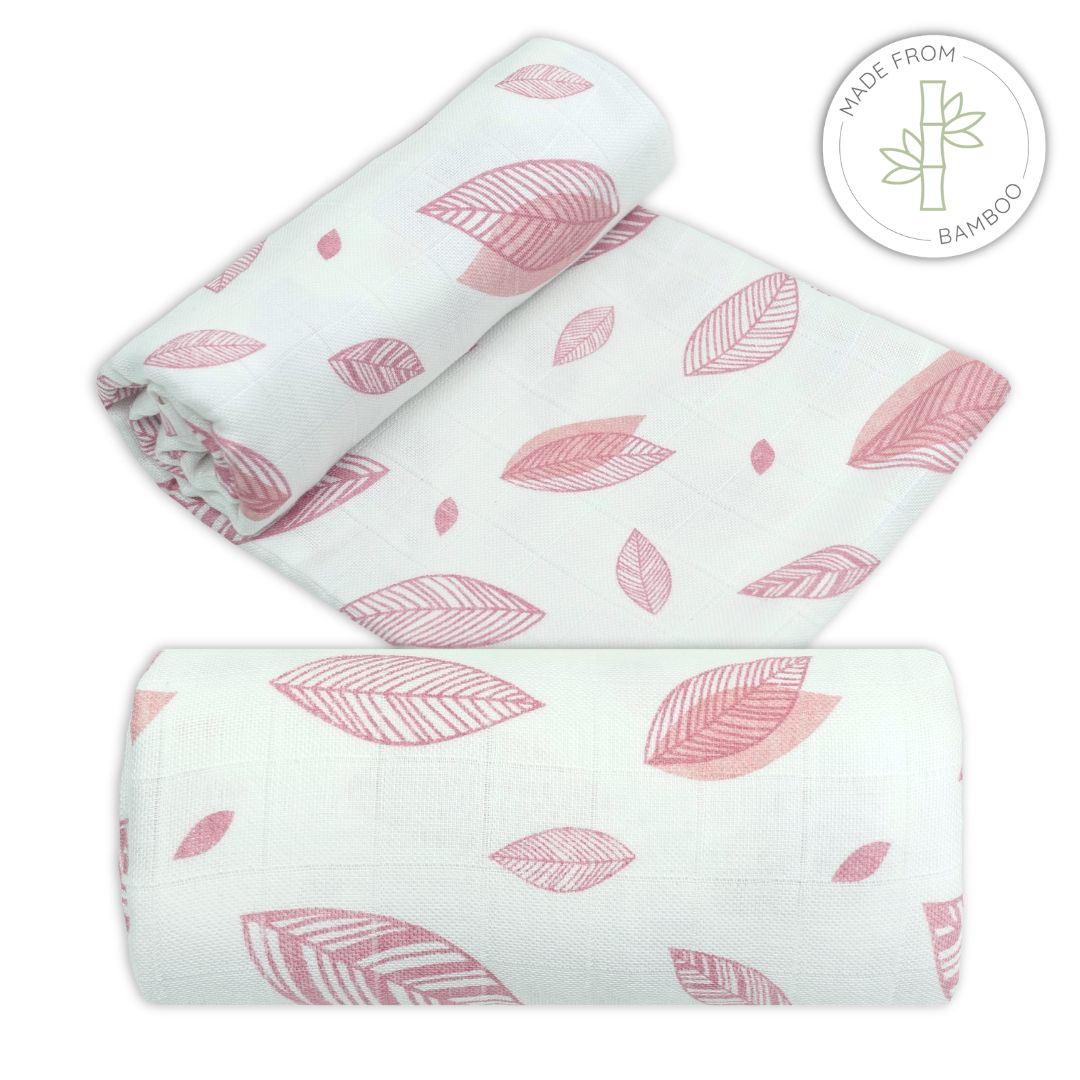 Muslin bamboo swaddles with pink leaf pattern on a white background for babies
