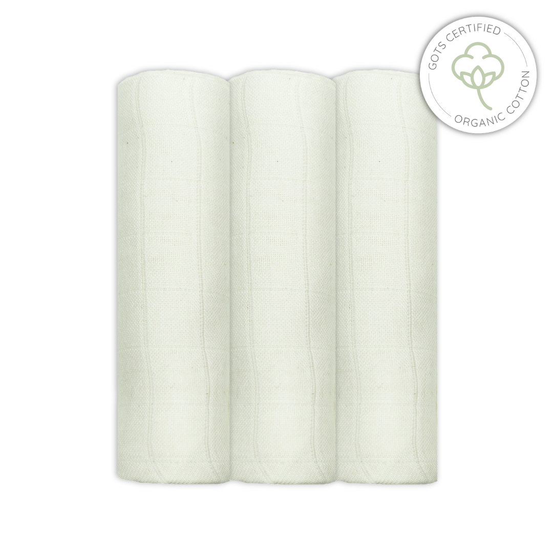 Three rolls of unbleached organic cotton muslins with a certification logo on a white background for babies