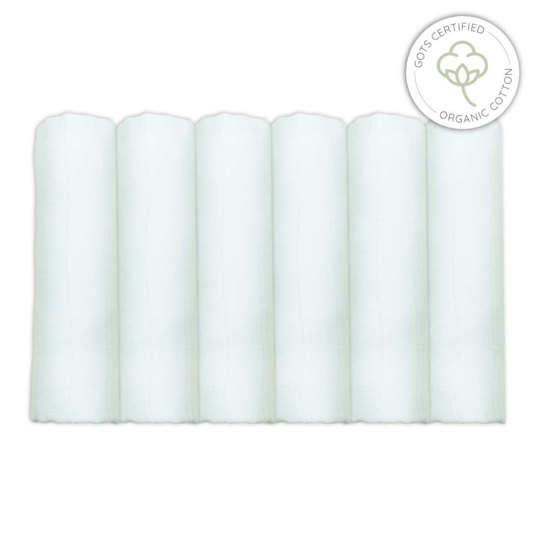 Set of 6 white organic cotton muslins with a certification logo on a white background